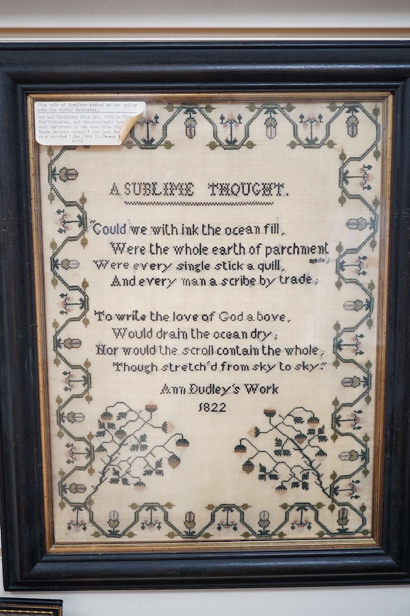 Two early 19th century finely worked samplers: One 'A Sublime Thought', dated 1822 by Ann Dudley, simply worked with verse and a wide vineous border and two oak trees, the other a register of the children of Samuel and A